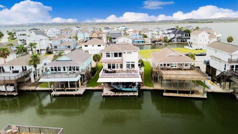 Photo of 1323 Wahini Street, Tiki Island, TX 77554 (MLS # 53664136)