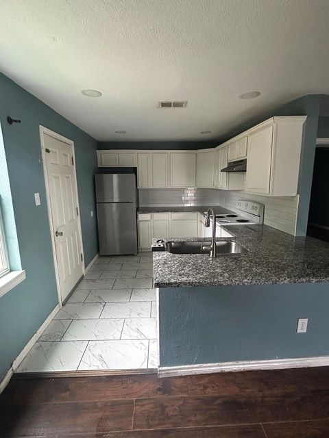 Photo of 312 10th St N ST, Texas City, TX 77590 (MLS # 50875798)