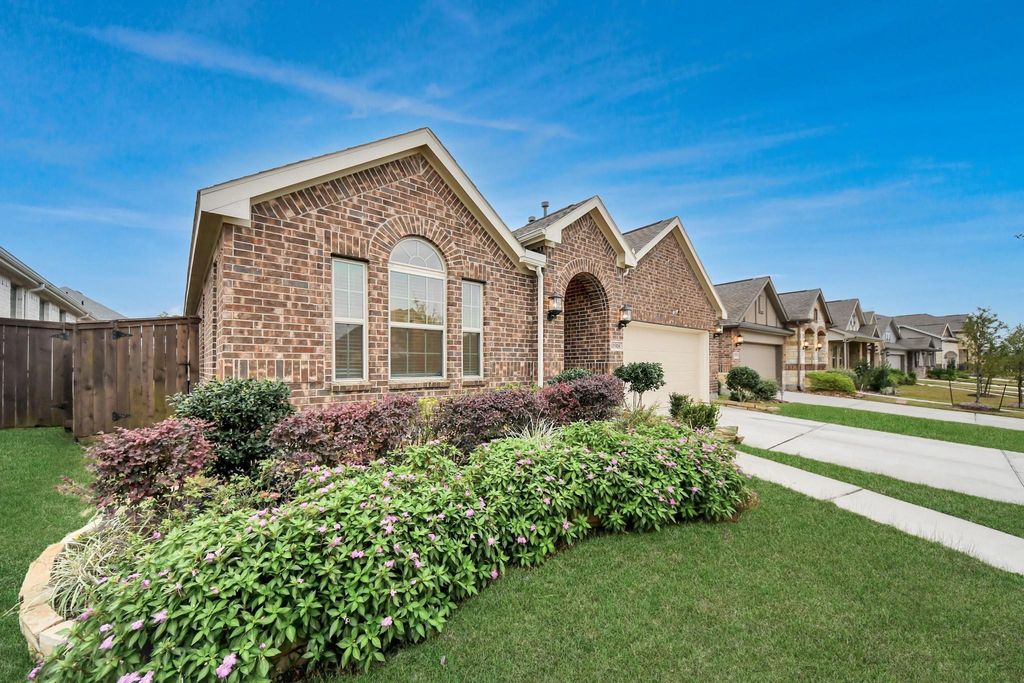 Photo of 11918 Red Admiral Road, Humble, TX 77346 (MLS # 96224843)