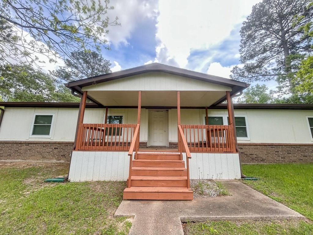 Photo of 3221 Kingston Drive, Huntsville, TX 77340 (MLS # 53614196)