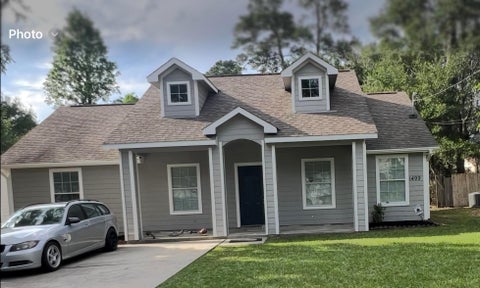 Photo of 1499 E Dallas Street, Conroe, TX 77301 (MLS # 26742242)