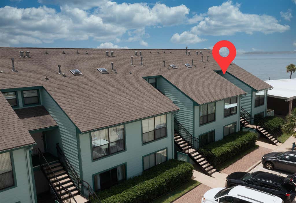 Photo of 7041 Kingston Cove Ln Ln #255, Willis, TX 77318 (MLS # 87356366)