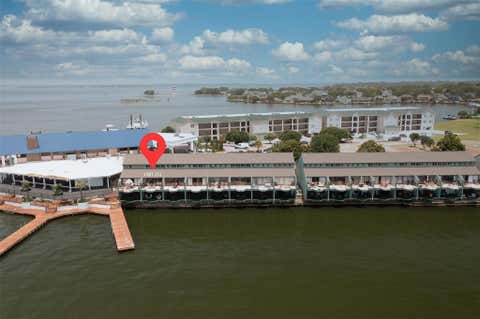 Photo of 7041 Kingston Cove Ln Ln #255, Willis, TX 77318 (MLS # 87356366)