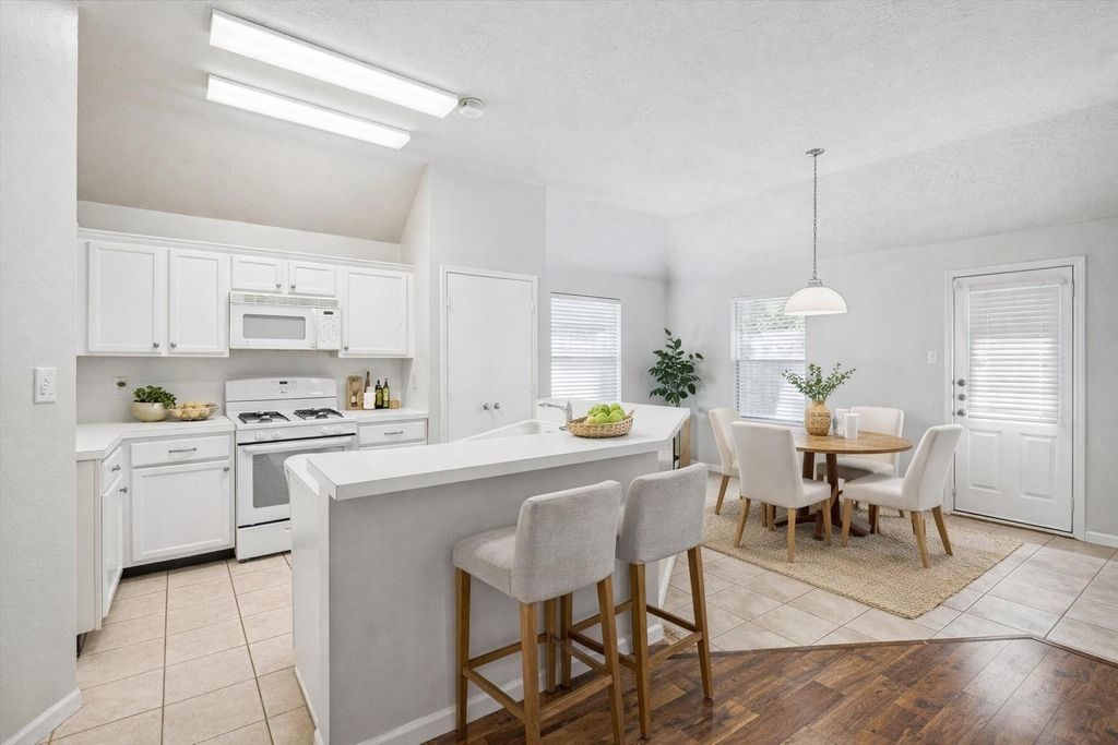 Photo of 1606 Blossom Creek Court, Houston, TX 77339 (MLS # 49821643)