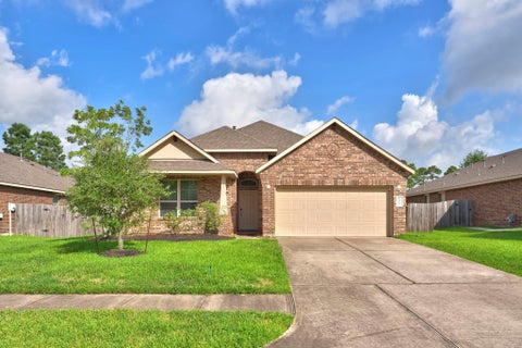 Photo of 14015 Routt Forest Trail, Conroe, TX 77384 (MLS # 56685973)
