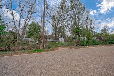 Photo of 13727 Adams Lane, Pinehurst, TX 77362 (MLS # 91496365)
