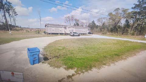 Photo of 1906 County Road 3434 N, Cleveland, TX 77327 (MLS # 89337018)