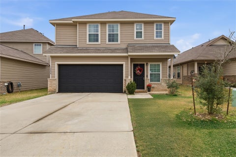 Photo of 13620 Collier Park Lane, Willis, TX 77378 (MLS # 12448045)