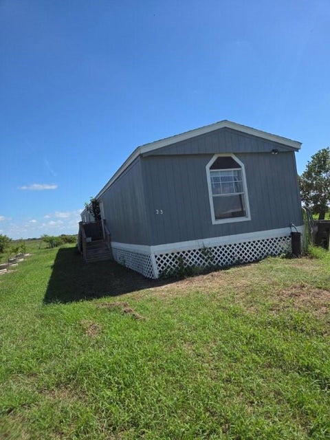 Photo of 33 Squid Lane, Palacios, TX 77465 (MLS # 89453400)