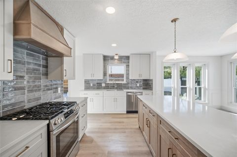 Photo of 11303 Olympia Drive, Houston, TX 77077 (MLS # 59389988)