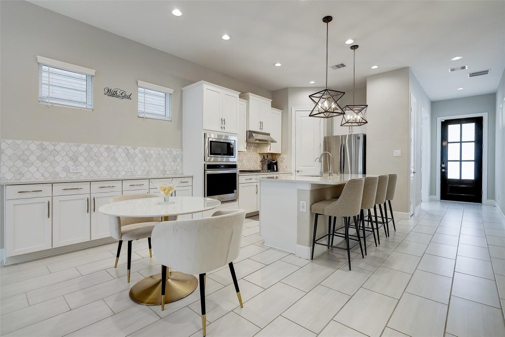 Photo of 9923 Granary Mill Place, Houston, TX 77080 (MLS # 14872000)