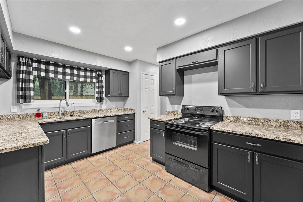 Photo of 3702 Ember Spring Drive, Houston, TX 77339 (MLS # 10646837)