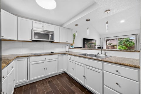 Photo of 13025 Leader Street, Houston, TX 77072 (MLS # 8875484)