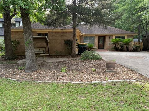 Photo of 377 Rolling Hills Drive, Panorama Village, TX 77304 (MLS # 71145194)