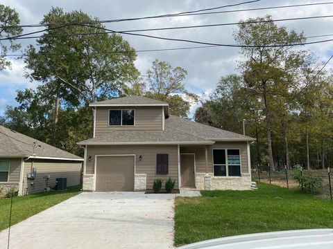Photo of 1113 W Cedar River Road, Conroe, TX 77316 (MLS # 31378850)
