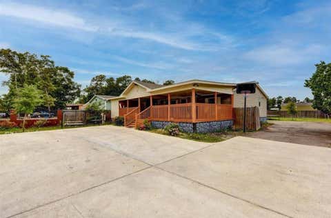 Photo of 16381 Hunters Green Dr Dr, Conroe, TX 77303 (MLS # 37889089)