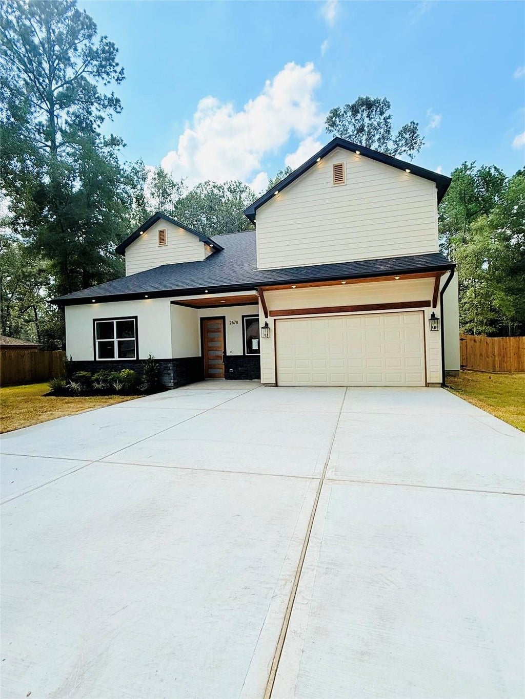 Photo of 2678 Colosseum Ct, New Caney, TX 77357 (MLS # 24826354)