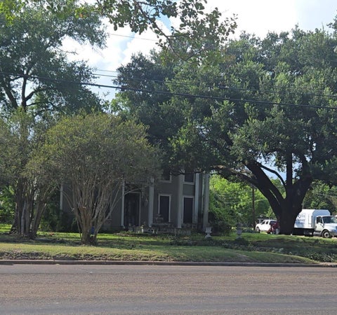 Photo of 815 E Washington Avenue, Navasota, TX 77868 (MLS # 55393385)