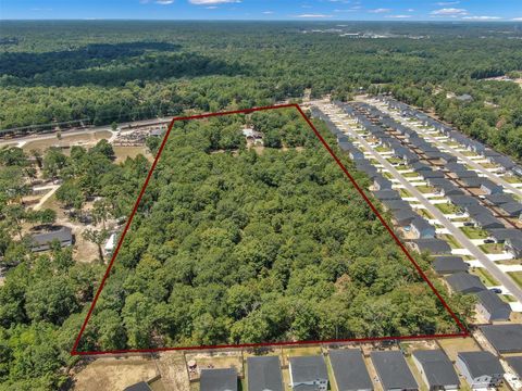 Photo of 10173 Crockett Martin Road, Conroe, TX 77306 (MLS # 15855718)