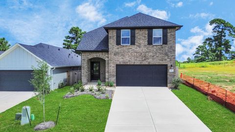 Photo of 19556 Stripe Hill Bend Bnd, Conroe, TX 77356 (MLS # 33654300)