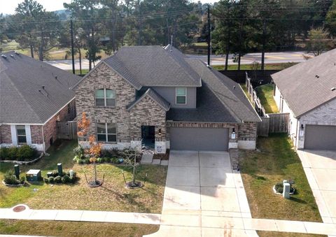 Photo of 20167 Bushwick Falls Drive, Montgomery, TX 77316 (MLS # 26452855)