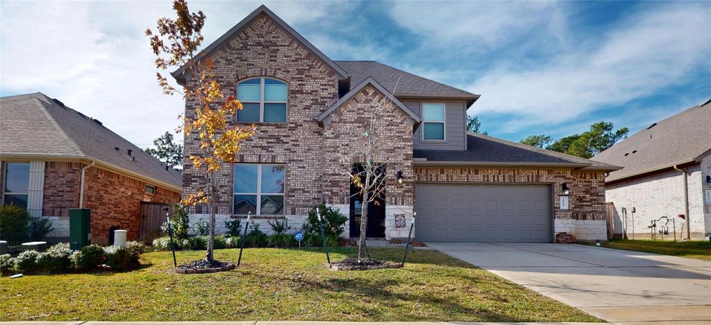Photo of 20167 Bushwick Falls Drive, Montgomery, TX 77316 (MLS # 26452855)