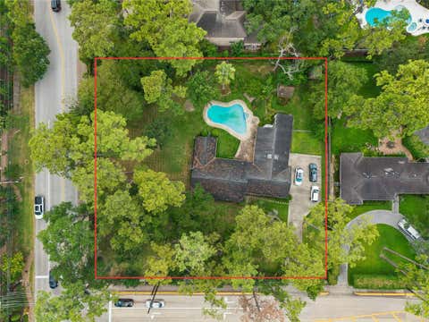 Photo of 711 Echo Lane, Houston, TX 77024 (MLS # 74842411)