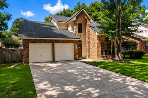 Photo of 4615 Natural Bridge Drive, Houston, TX 77345 (MLS # 34413971)