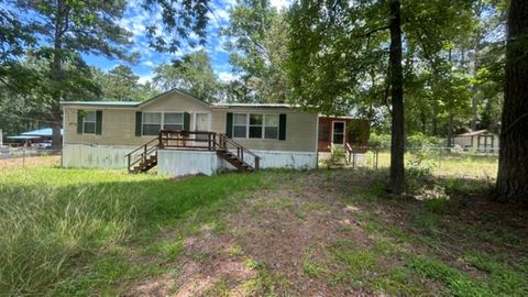 Photo of 16 Caddo Drive, Huntsville, TX 77320 (MLS # 16881399)