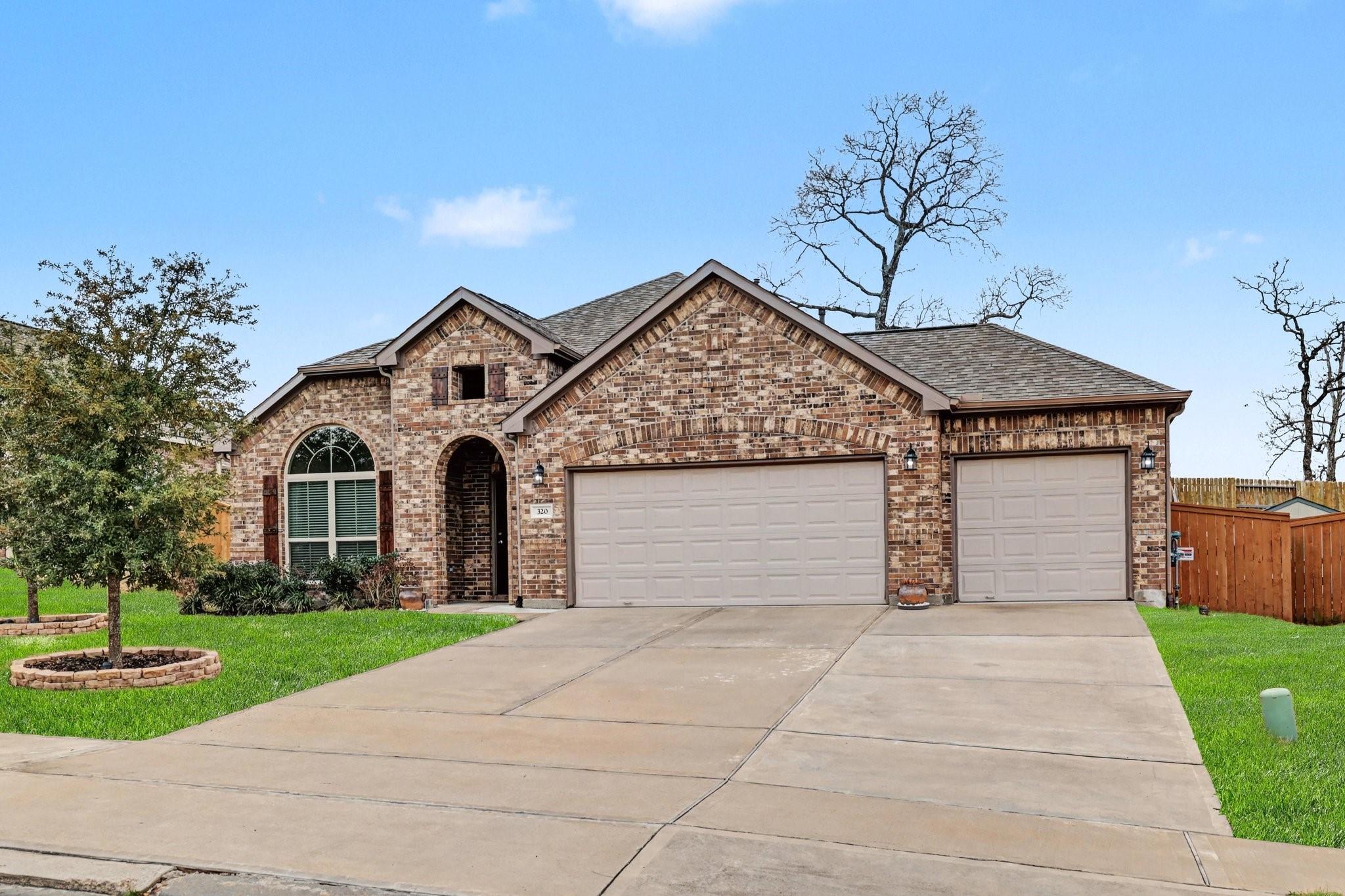 Well-designed kitchen with ample counter space, walk-in pantry, and classic finishes. Refrigerator included!