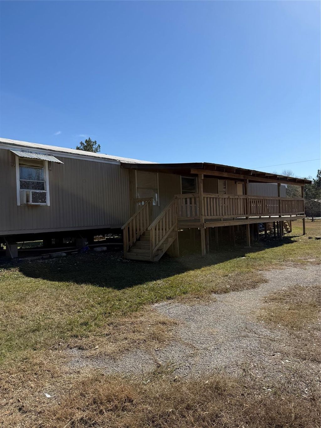 Photo of 1217 County Road 3404, Cleveland, TX 77327 (MLS # 25055547)