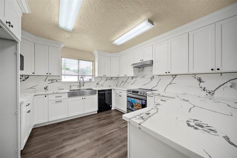 Photo of 14107 Woodnook Drive, Houston, TX 77077 (MLS # 42267800)