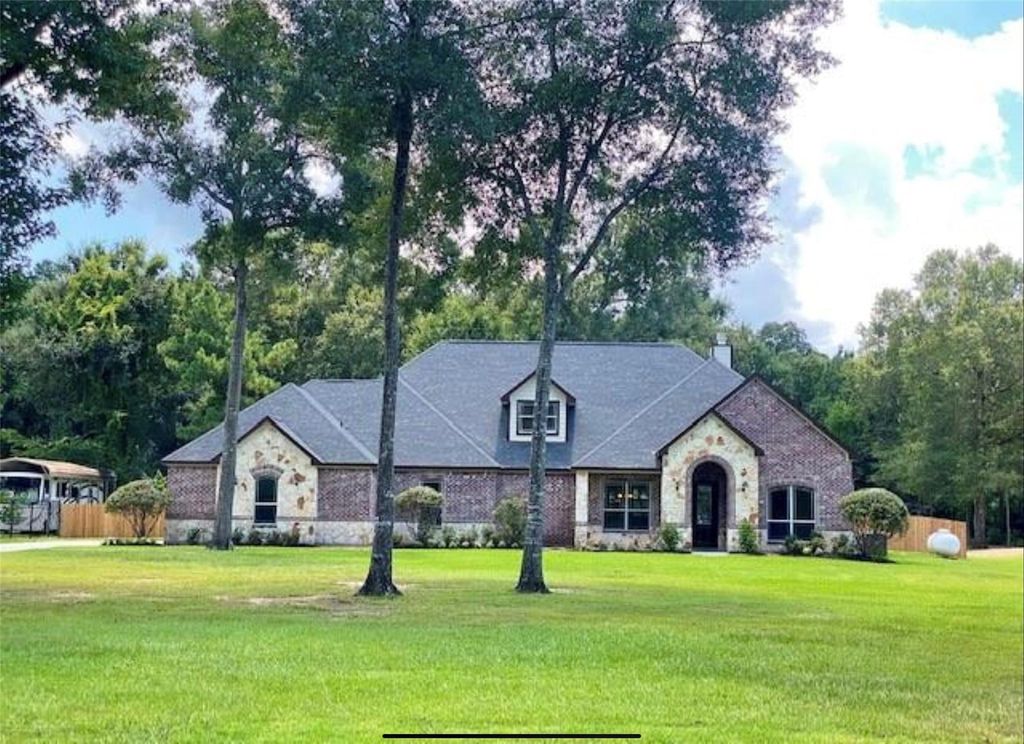 Photo of 818 Commons Lake Edge Drive, Huffman, TX 77336 (MLS # 61642620)