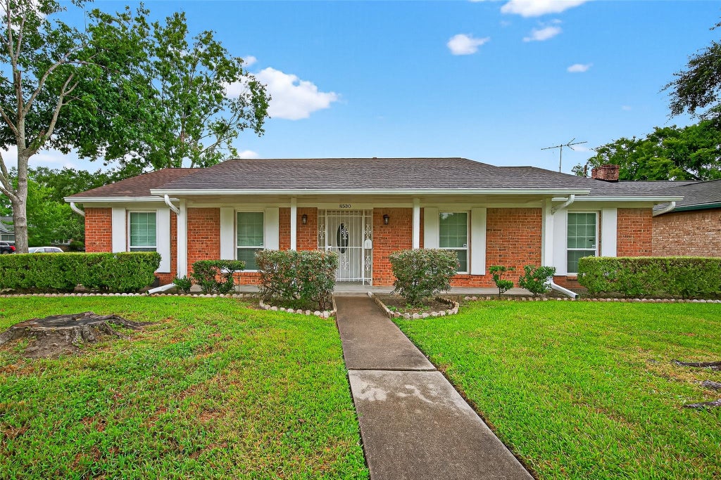 Photo of 8530 Roos Road, Houston, TX 77036 (MLS # 71457763)