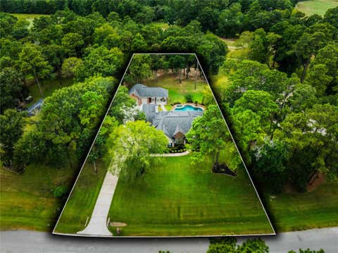 Photo of 10635 Clubhouse Circle, Magnolia, TX 77354 (MLS # 54095965)