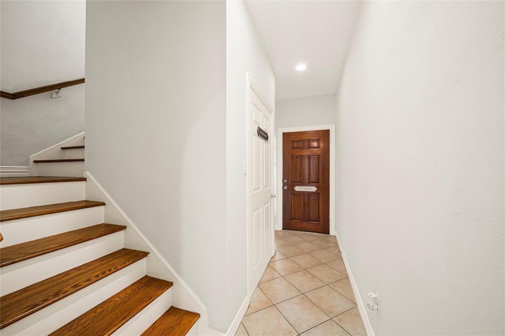 Photo of 6111 Windwater Pointe, Houston, TX 77036 (MLS # 49452272)