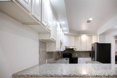 Photo of 12625 Memorial Drive #4, Houston, TX 77024 (MLS # 88837249)