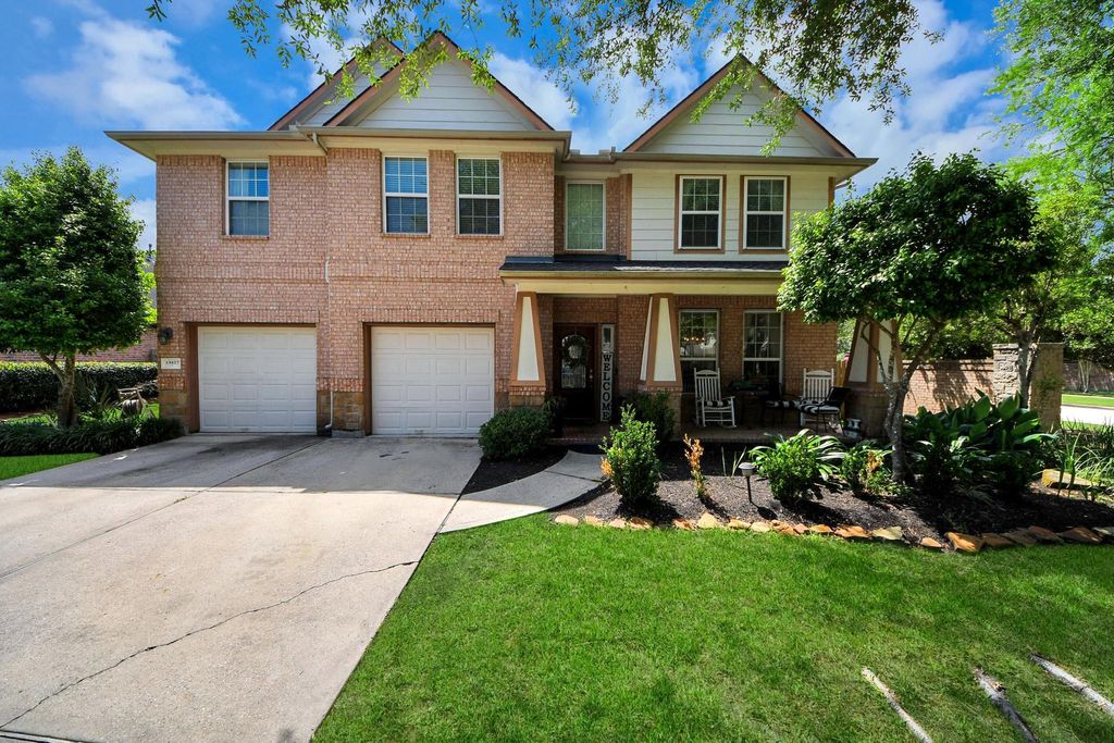 Photo of 13827 Pepperstone Lane, Houston, TX 77044 (MLS # 97097596)