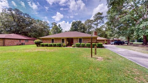 Photo of 806 Camphor Circle NE, Village Mills, TX 77663 (MLS # 91773903)