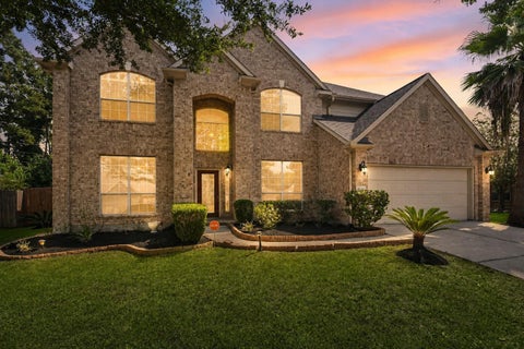 Photo of 8718 Rolling Rapids Road, Humble, TX 77346 (MLS # 67401271)