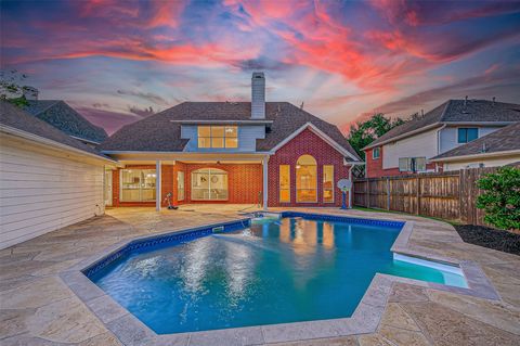 Photo of 13011 Mossy Ridge Cove, Houston, TX 77041 (MLS # 17819055)