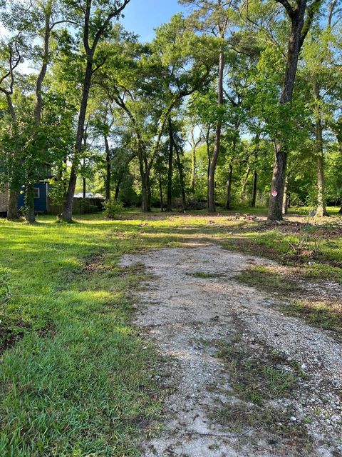 Photo of 4922 Blackberry Lane, Old River-Winfree, TX 77535 (MLS # 93641132)