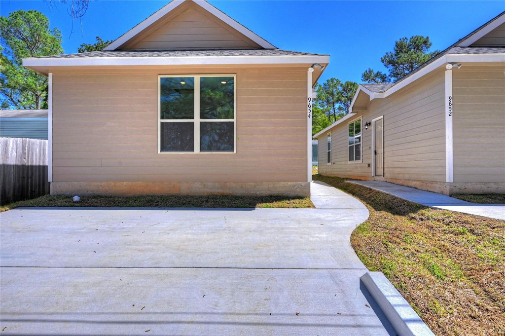 Photo of 11779 White Cedar St, Willis, TX 77318 (MLS # 78170474)