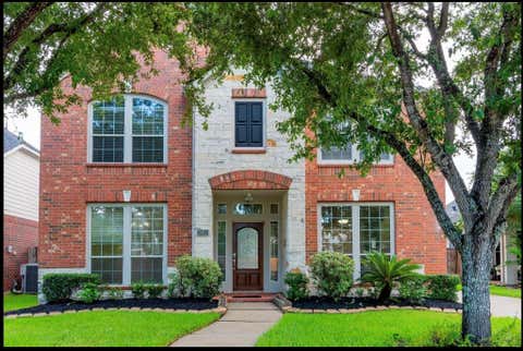 Photo of 20810 Avery Cove Lane, Katy, TX 77450 (MLS # 47846507)