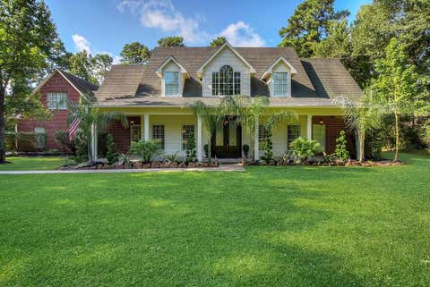 Photo of 10819 Lake Windcrest Dr, Magnolia, TX 77354 (MLS # 95756968)