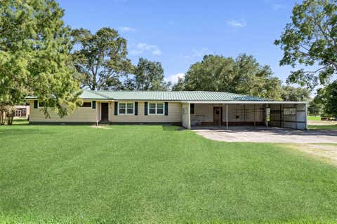 Photo of 621 Henry Lane, Winnie, TX 77665 (MLS # 46025949)