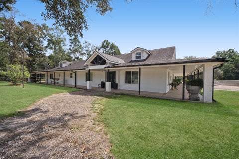 Photo of 10677 Fm 2432 Road, Conroe, TX 77303 (MLS # 58872358)