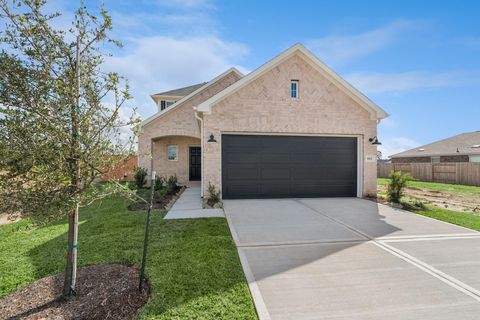 Photo of 845 Village Brook Drive, Willis, TX 77378 (MLS # 23609338)