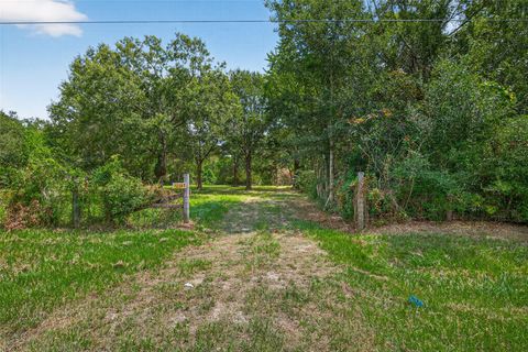 Photo of 12297 Rebel Road, Cleveland, TX 77327 (MLS # 42838051)