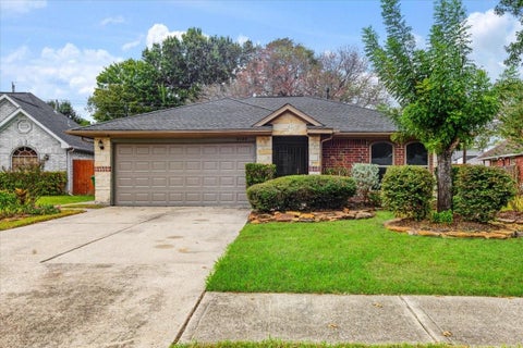 Photo of 6123 Springhaven Drive, Houston, TX 77396 (MLS # 79956175)